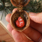 Sleeping squirrel necklace in a walnut box
