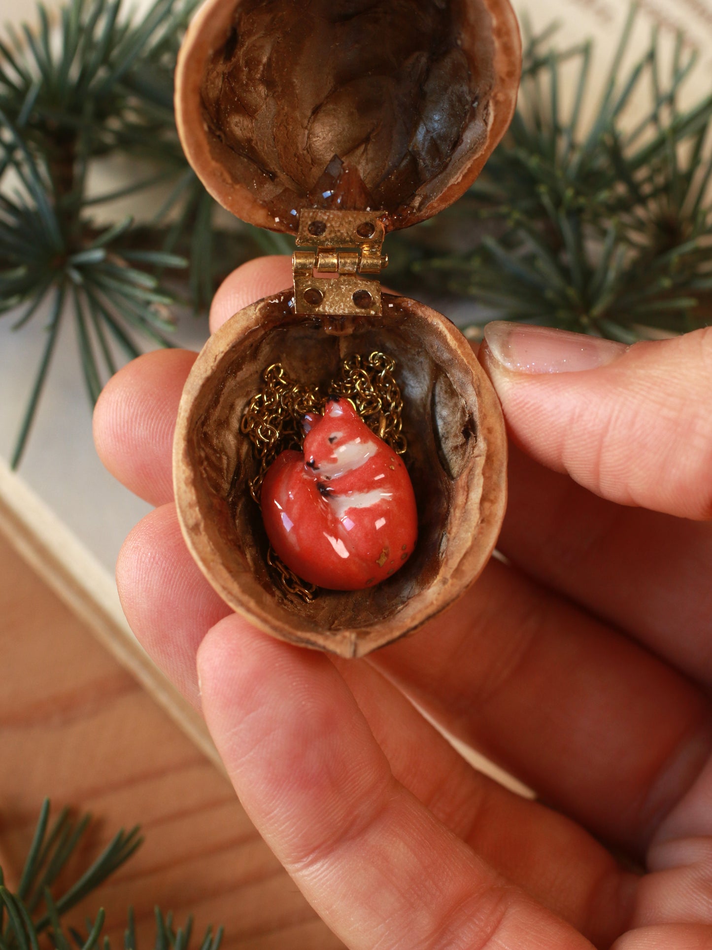 Sleeping squirrel necklace in a walnut box