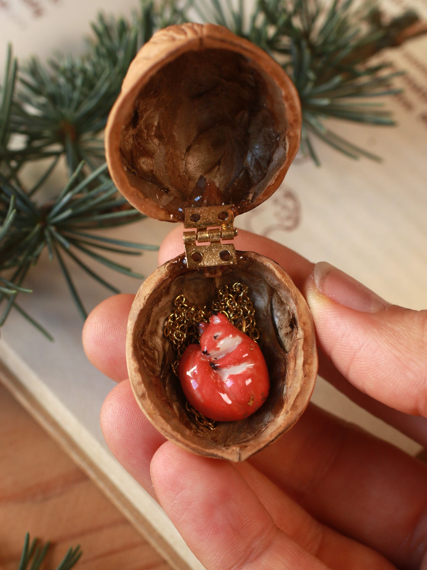 Sleeping squirrel necklace in a walnut box
