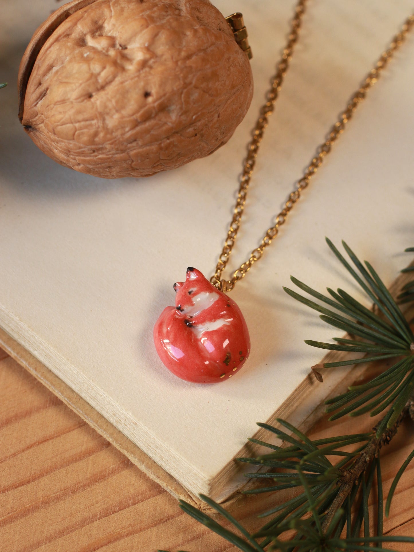 Sleeping squirrel necklace in a walnut box