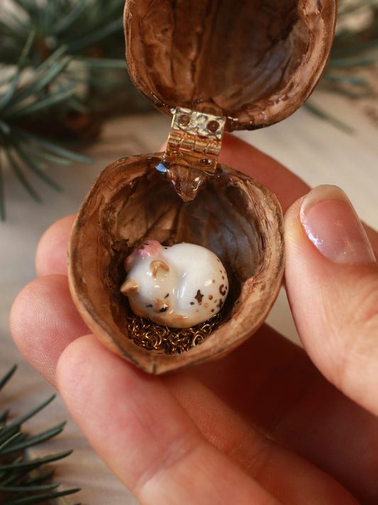 Sleeping cat necklace in a walnut box
