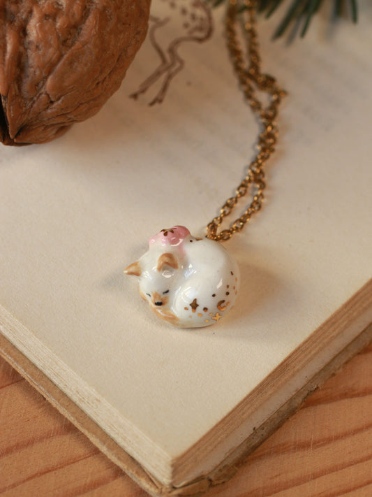 Sleeping cat necklace in a walnut box
