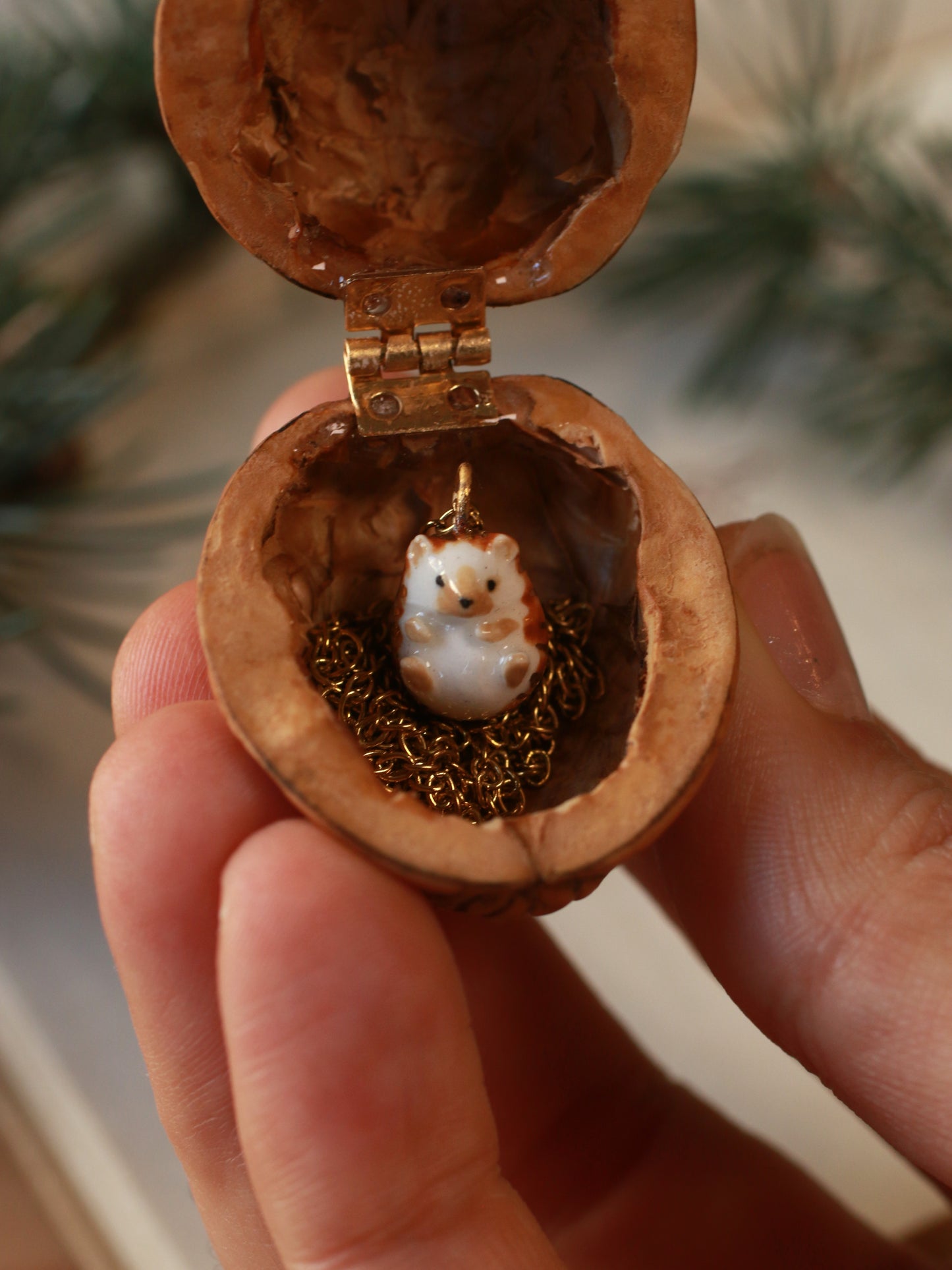 Hedgehog necklace in a walnut box