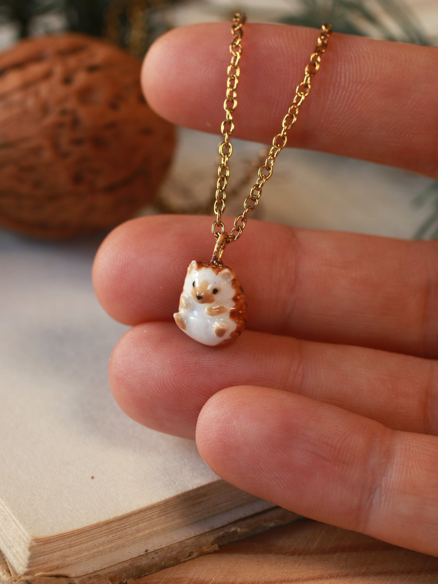 Hedgehog necklace in a walnut box