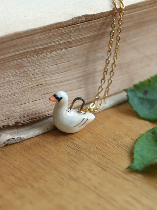 Ceramic Swan necklace - 22k gold details