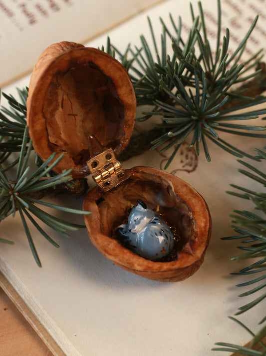 Sleeping starry wolf necklace in a nutshell box