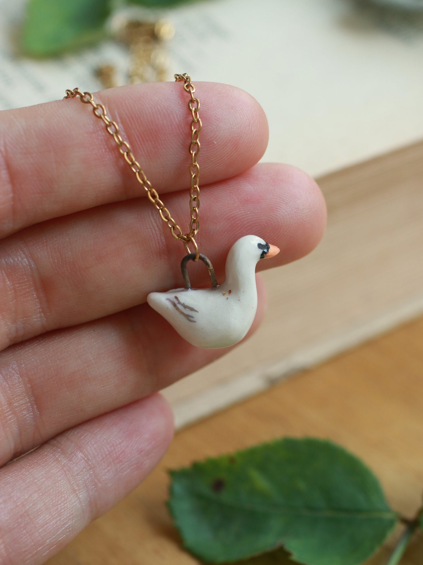 Ceramic Swan necklace - 22k gold details