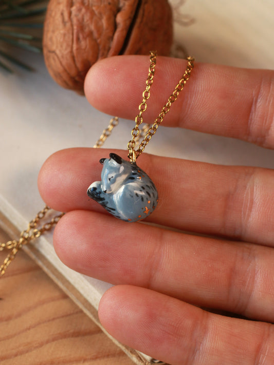 Sleeping starry wolf necklace in a nutshell box