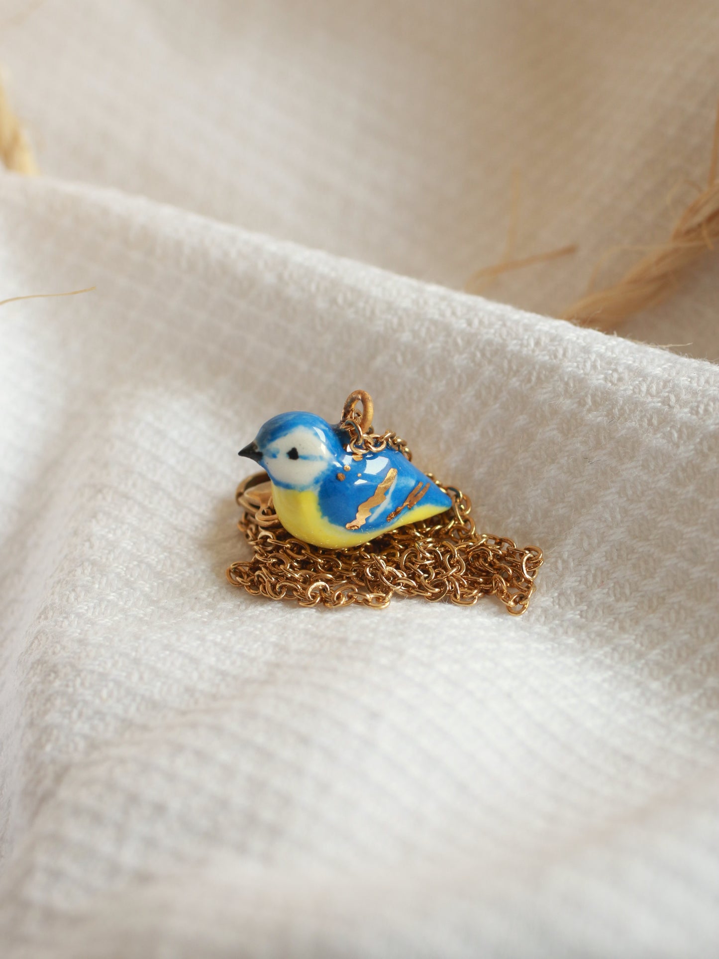 Blue tit necklace - 22k gold details