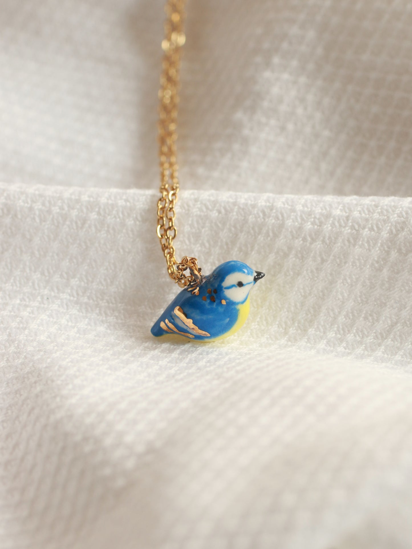 Blue tit necklace - 22k gold details