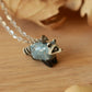 Raccoon necklace - silver details