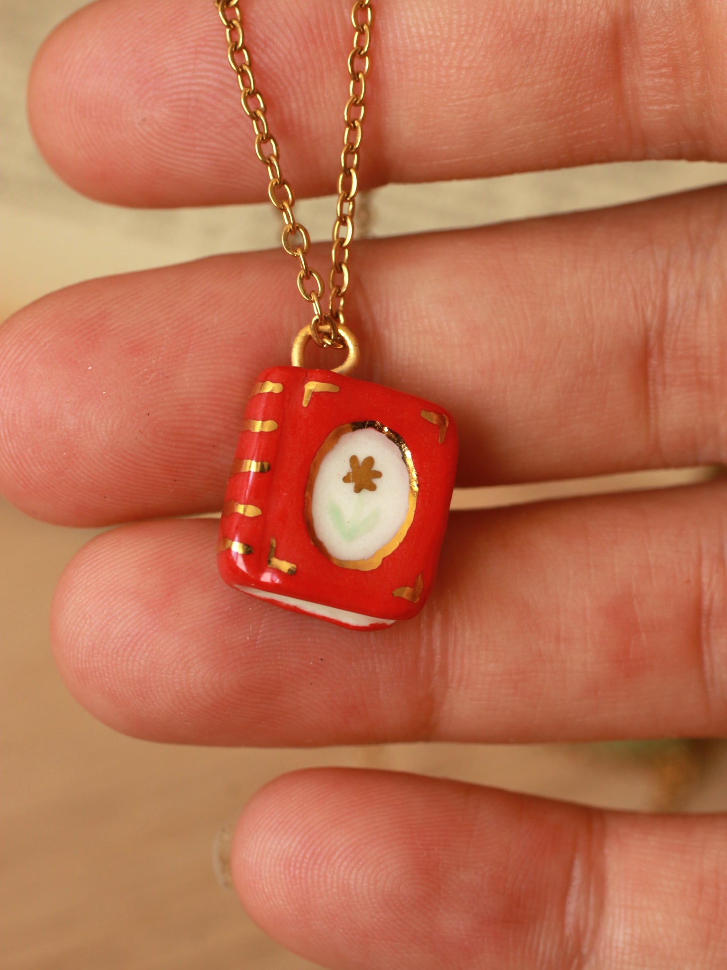 Red flower book necklace