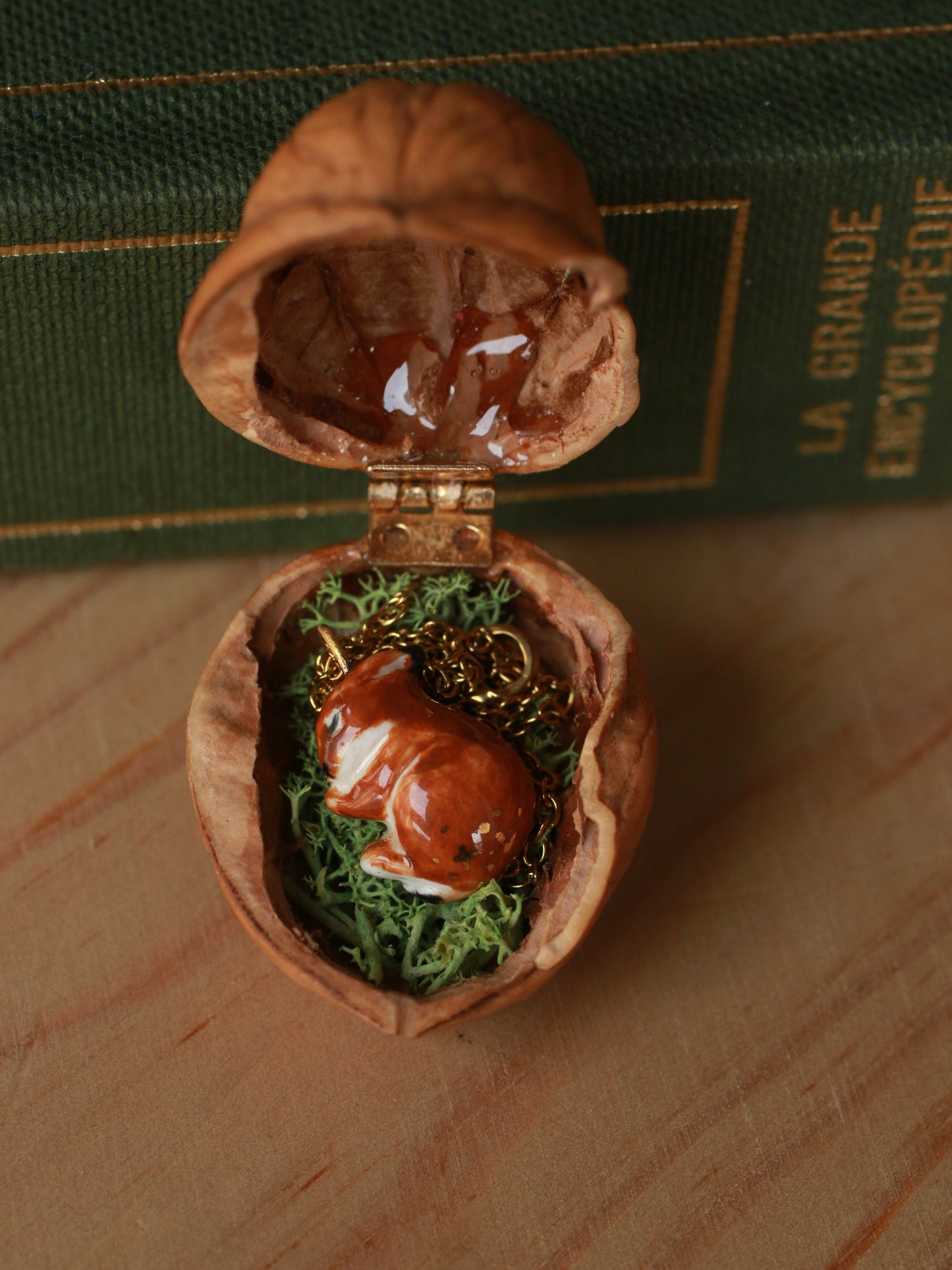 Sleeping bunny necklace in a walnut box
