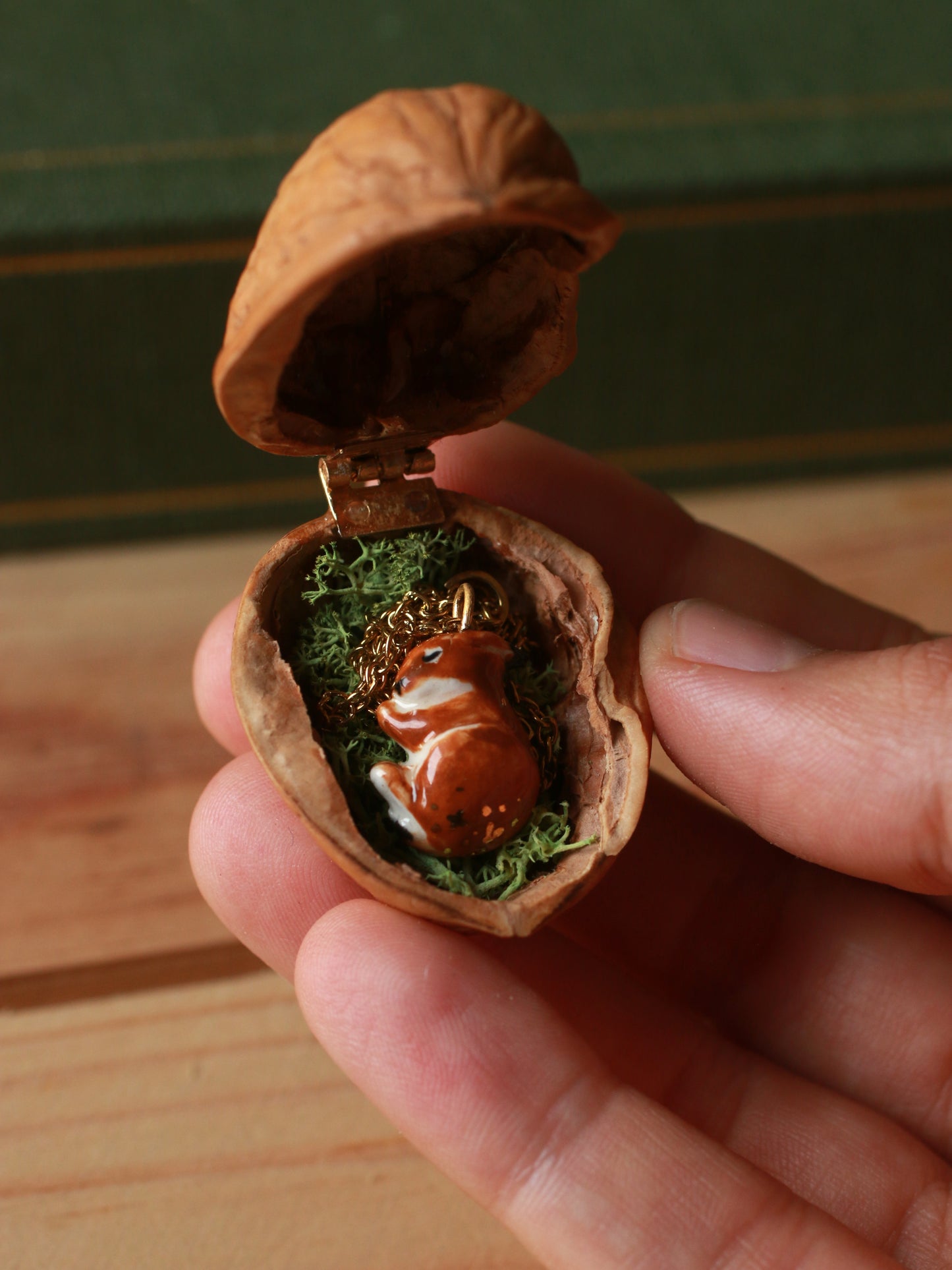 Sleeping bunny necklace in a walnut box