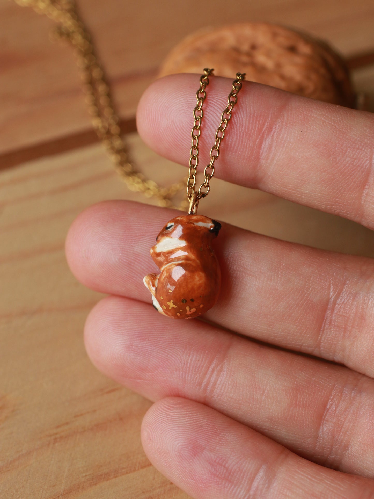 Sleeping bunny necklace in a walnut box