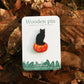 Black cat on a Jack-o'-Lantern wooden pin