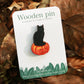 Black cat on a Jack-o'-Lantern wooden pin
