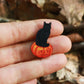 Black cat on a Jack-o'-Lantern wooden pin