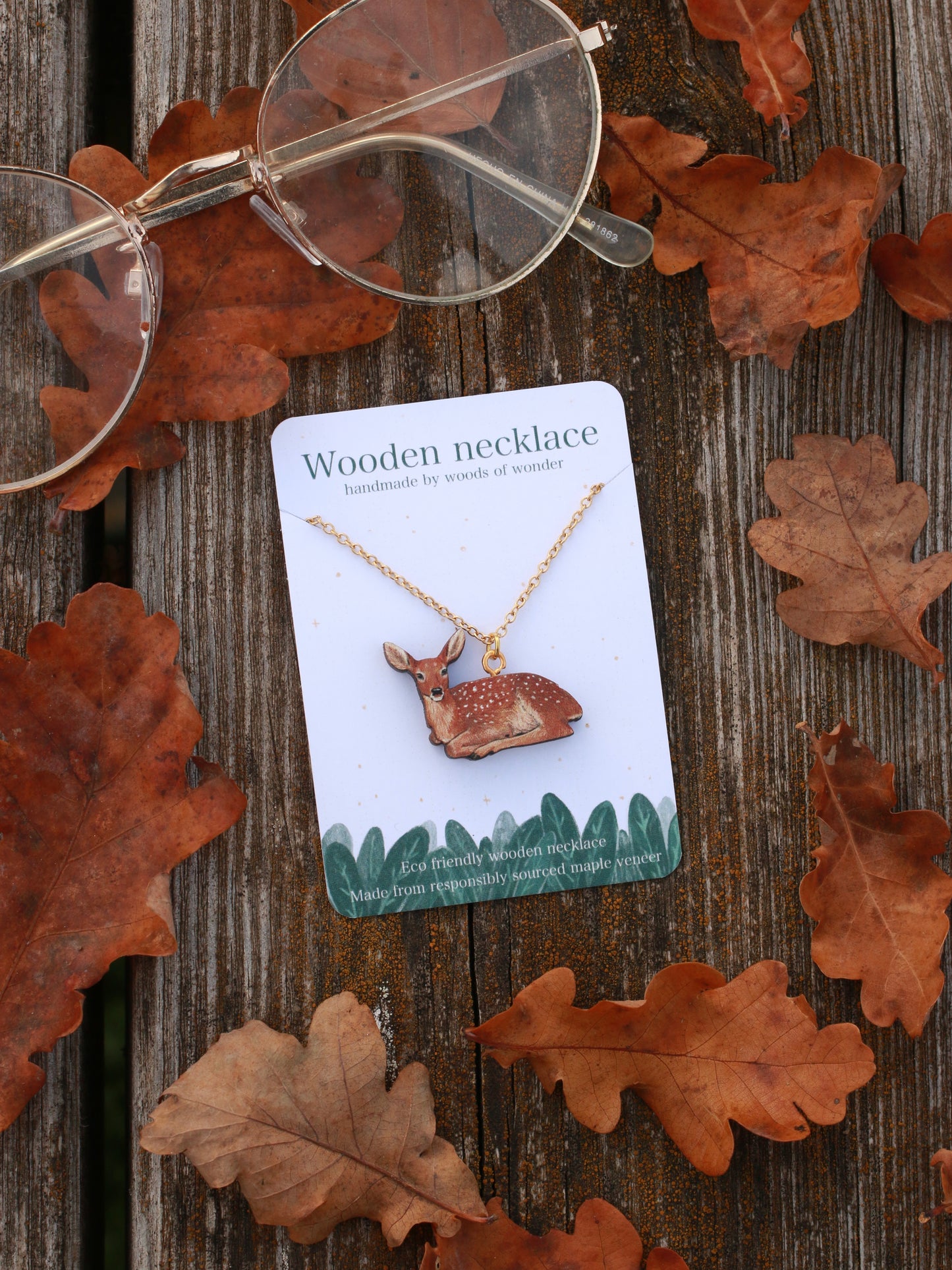 Resting deer wooden necklace