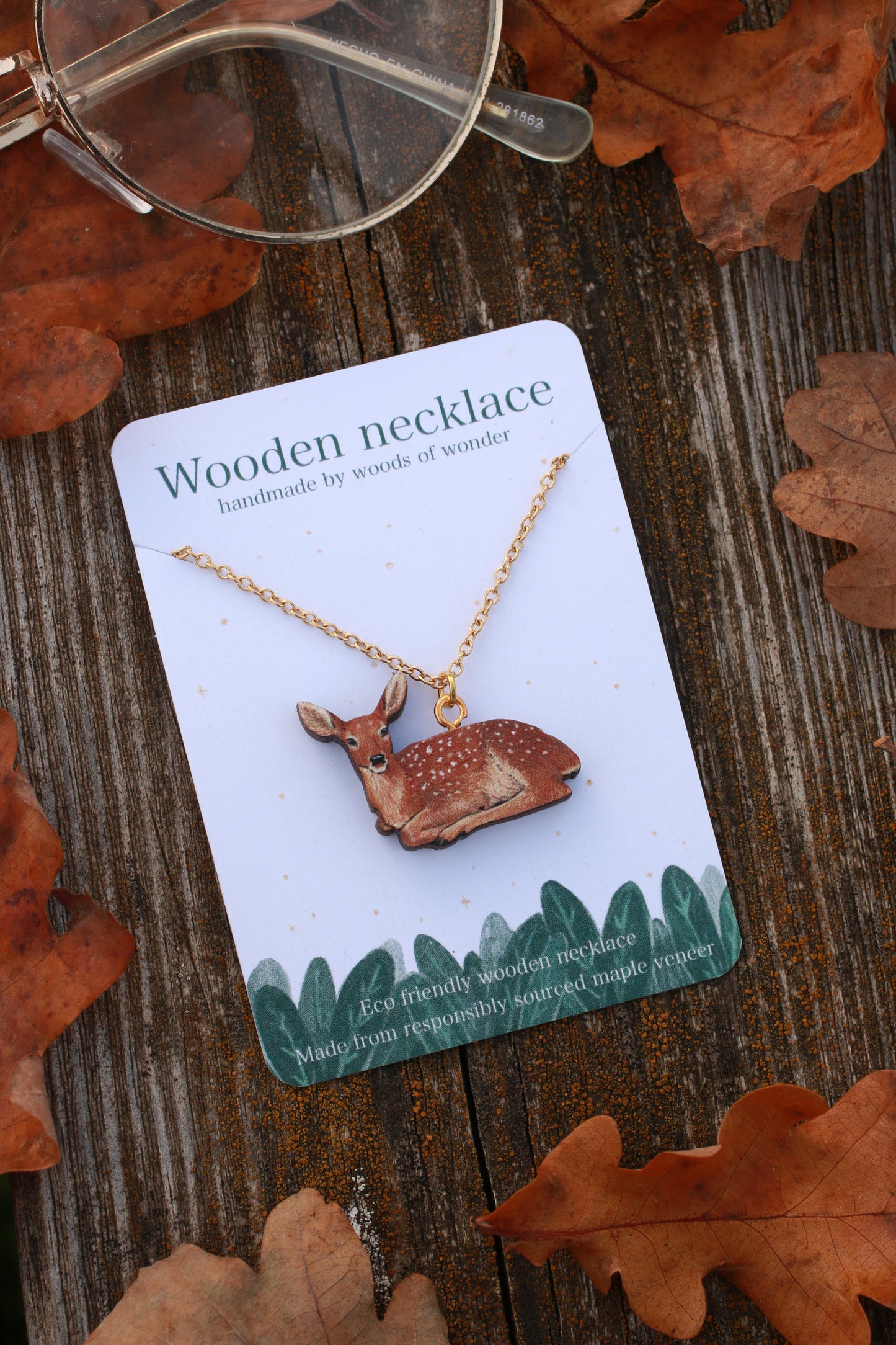 Resting deer wooden necklace