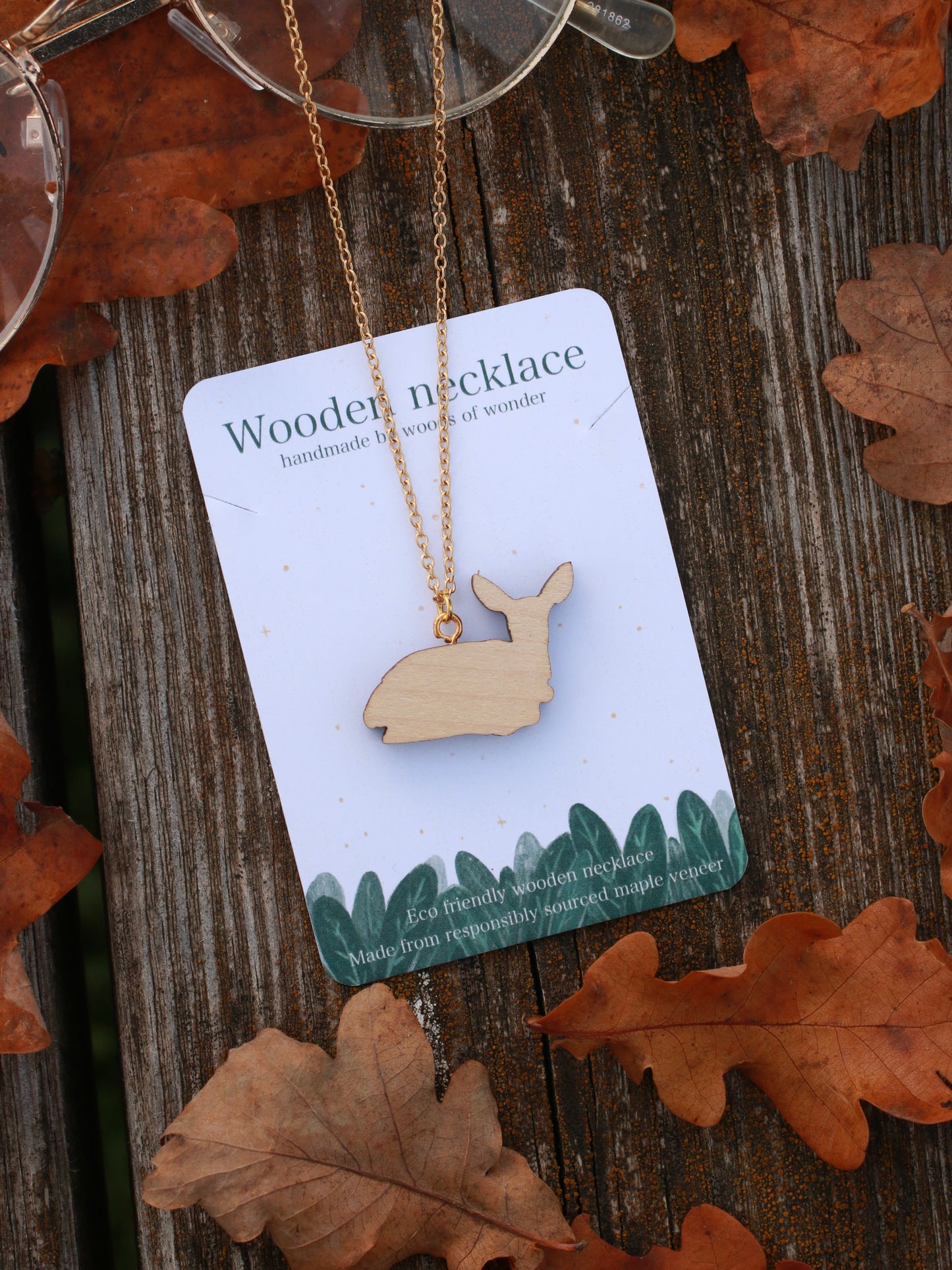 Resting deer wooden necklace