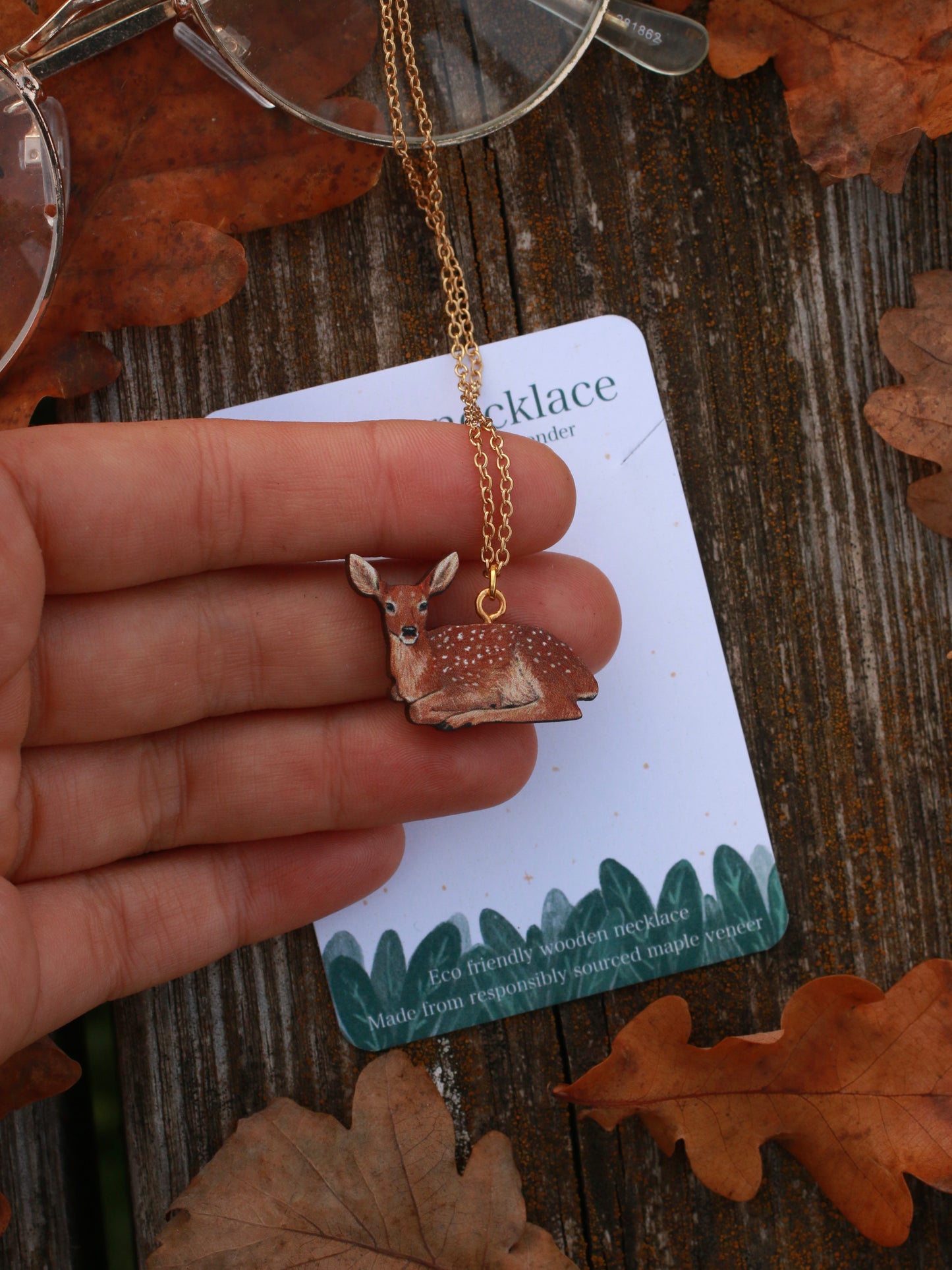 Resting deer wooden necklace