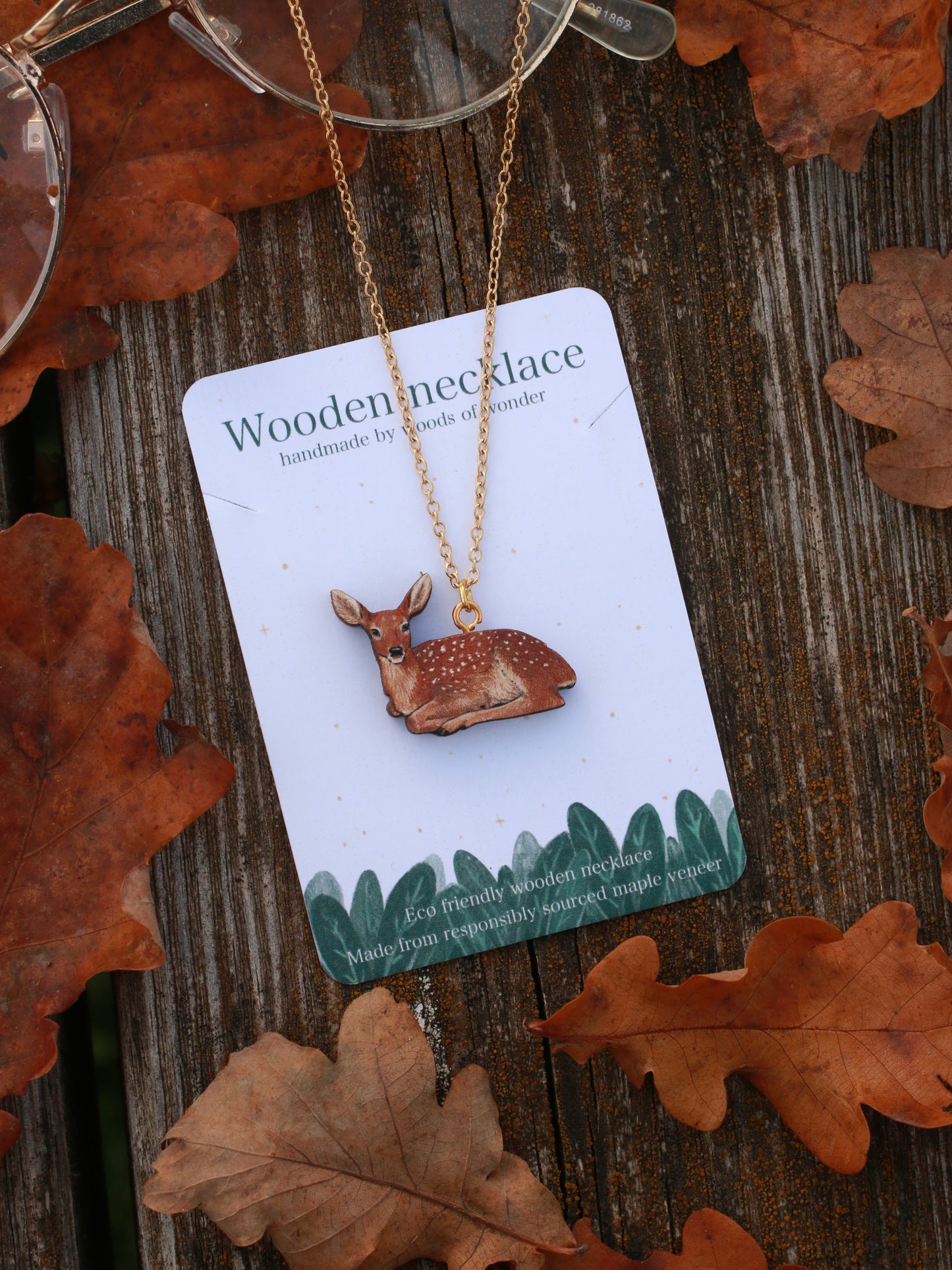 Resting deer wooden necklace